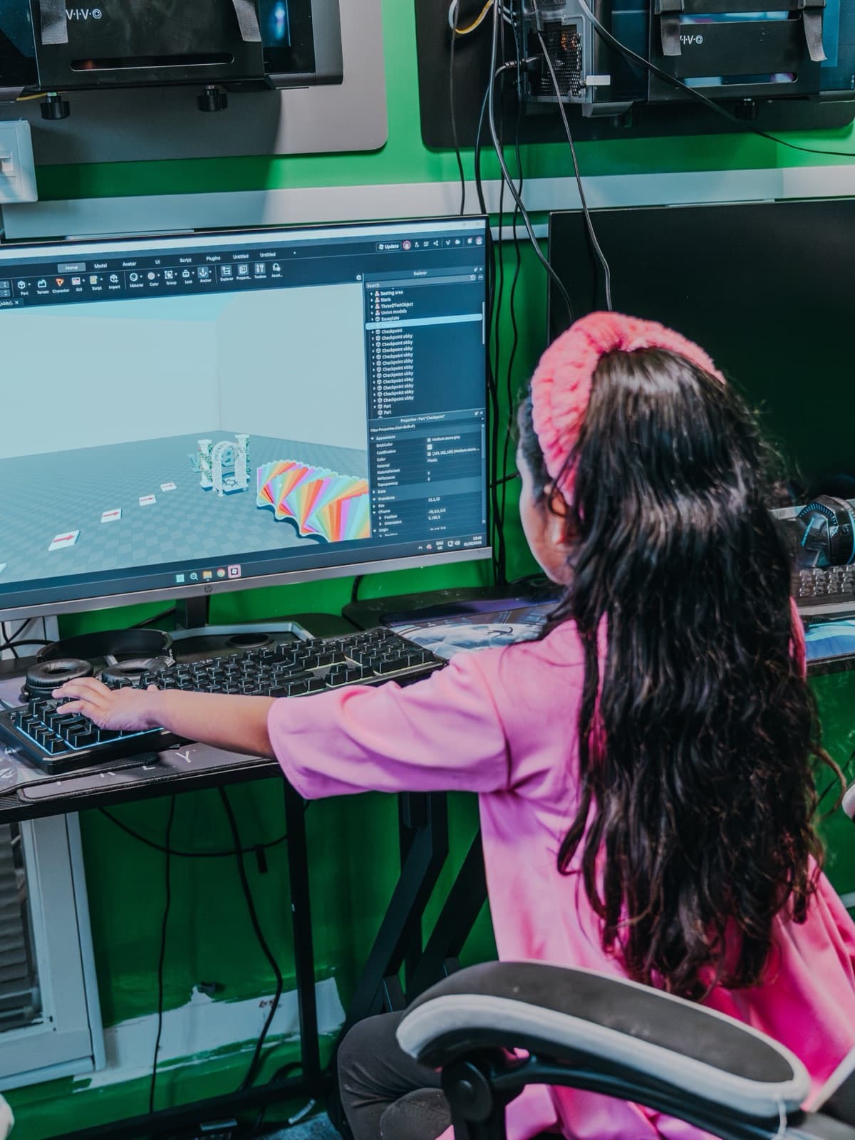 Student at a racing simulator station at Robocode centre